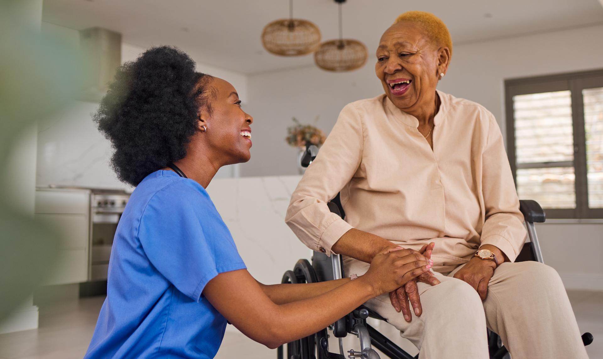 Nurse caring for elderly woman